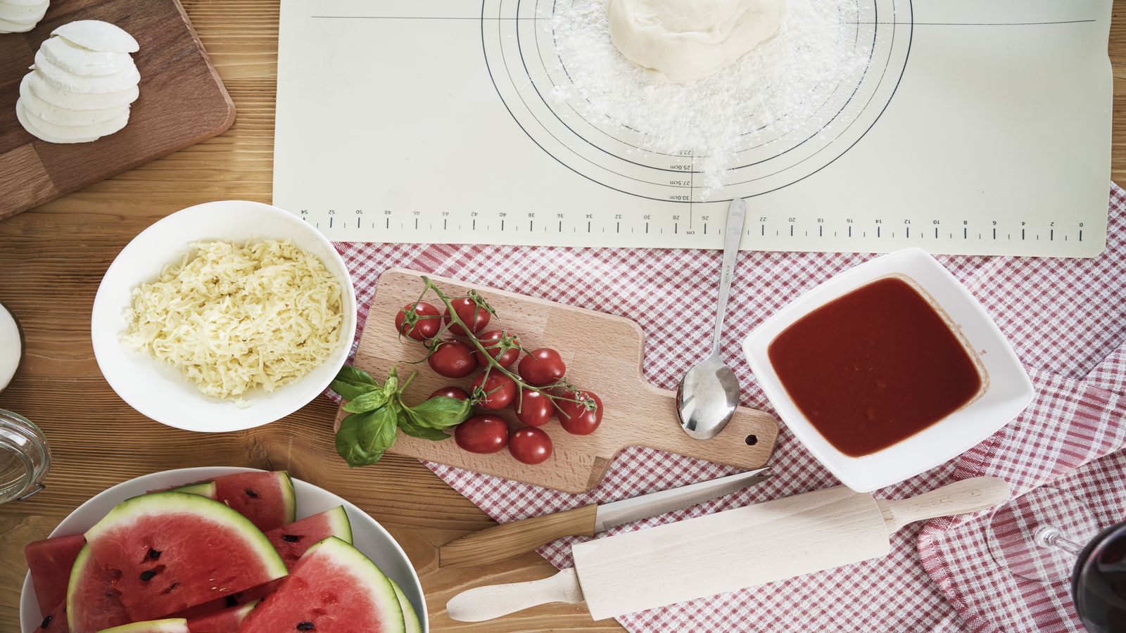 Kitchen scales, measuring tape, and shopping receipt showing fractions in everyday use